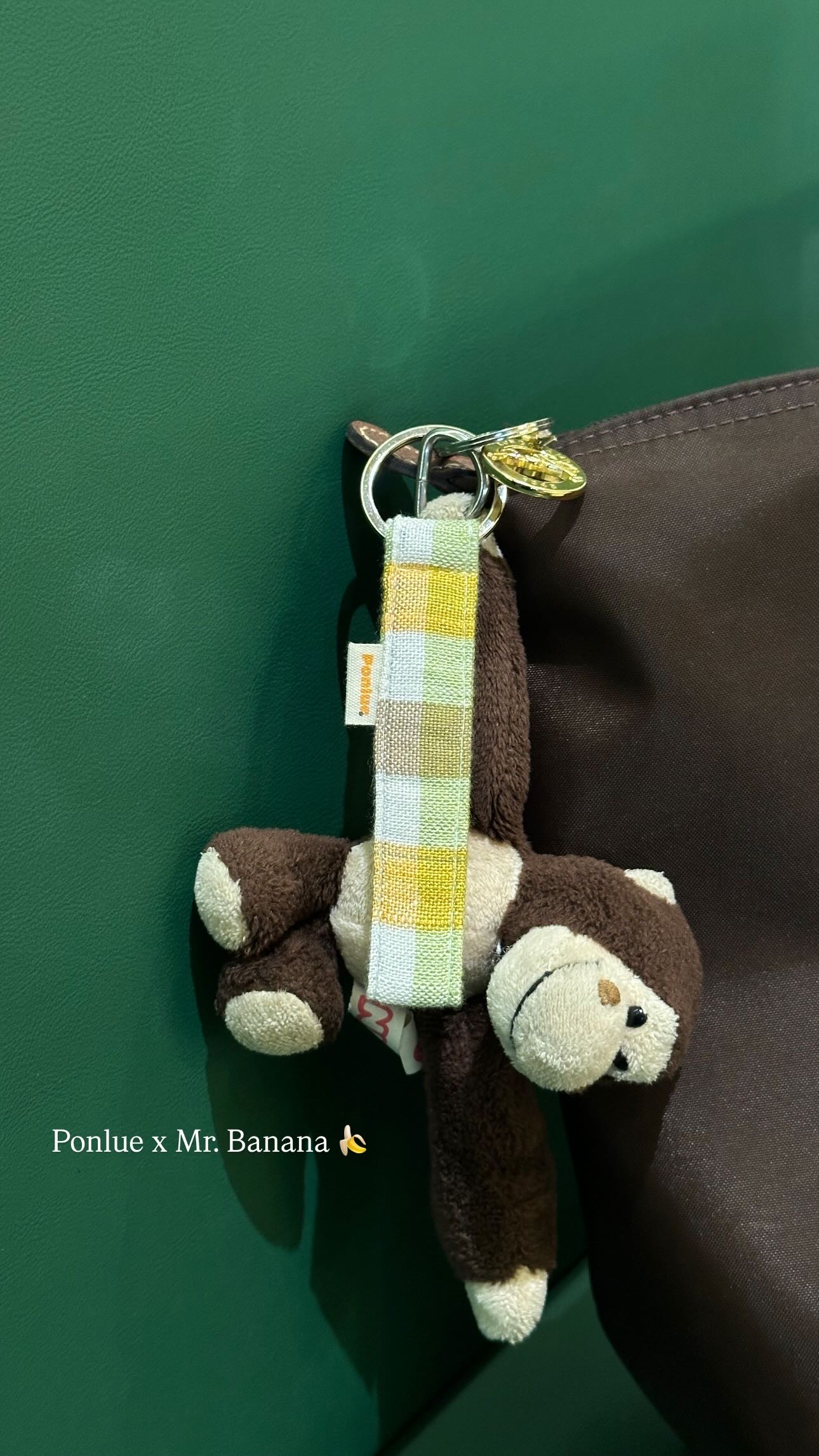 Ponlue Kroma keychain attached to a plush charm